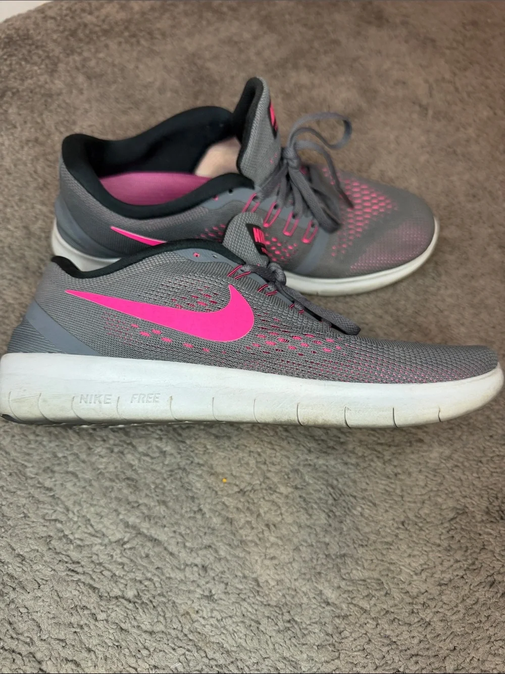 Nike Gray Athletic Sneakers with Pink Swoosh